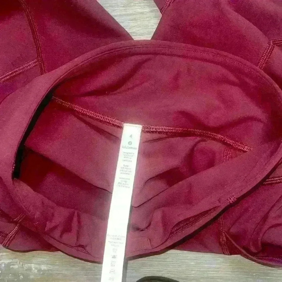 Lululemon Tight Stuff Tight II 25" size 4 like new condition 
Deep Ruby - Picture 13 of 16